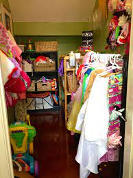 Our Closet Under The Stairs Is Used To Organize The Dress Up Clothes Hair Accessories Kids Toys The Mail Room Chan Under Stairs Space Under Stairs Mail Room