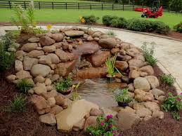 Thanks also go to another older son who contributed a few heavier rocks as well, and my hubby who was in. Building A Garden Pond Waterfall How Tos Diy