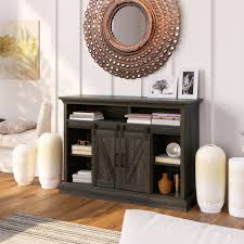 Featuring a 23 electric fireplace insert, the console can heat any room up to 400 square feet. Whalen