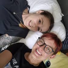 nas rocking the green and orange renegade pelle pelle to perfection .  🔥🔥🔥🔥🔥🔥🔥🔥🔥🔥🔥🔥🔥