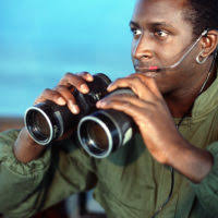 Senior AIRMAN (SRA) Robert Q. Krisik, a radiologist with the 655th Tactical  Hospital, logs in his quality control comments concerning an X-ray during  Exercise TEAM SPIRIT'86