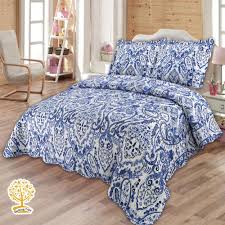 Wake up to the soft feel of warmth and comfort every morning. Blue Paisley Quilted Bedspread Cum Quilt All Home Living