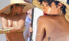 Rihanna reveals tan lines as she poses topless for Vogue Brazil photoshoot  on the beach | Daily Mail Online