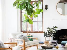 An ottoman that doubles as a coffee table can provide extra seating. Clever Small Living Room Ideas