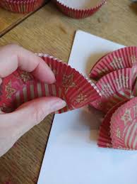 Make these spring flower crafts in your classroom for mother's day or to add to any flower theme. Cupcake Liner Flowers For Mom Dolceamericana