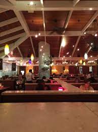 This place can get really busy on the weekends and does not take reservations. All Seating In Main Room Had A Circular Booths So You Face The Your Party Ahikethroughlife Picture Of Coastal Flats Tysons Corner Tripadvisor