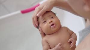 Particularly with newborns, there's just no need. Adorable Asian Newborn Baby Girl Washing Hair Taking Bath Her Stock Video C Cherayut000 273165738
