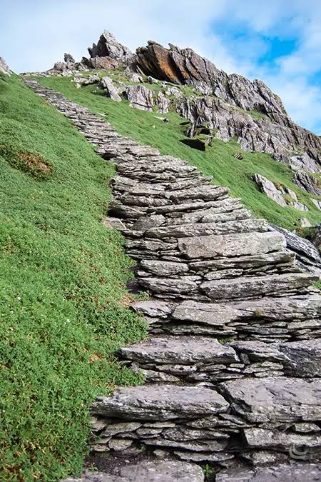 The 600+ hand-carved stone steps up Skellig Michael — steep, unrailed, and unforgiving in wet weather., AI generated