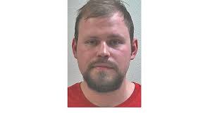 Superior city councilor arrested, faces four charges