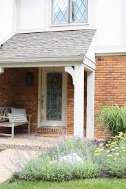 Our Garden Filled With Catmint Grasses Russian Sage Lambs Ear Roses And Yarrow Tudor House Exterior Tudor Exterior Paint Paint Colors