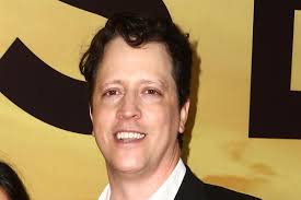 Illusionist Andrew Mayne displays shark suit