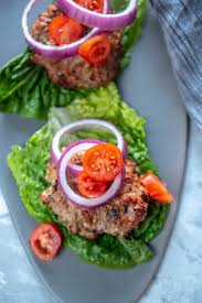 Open drawer and season the top side of the burger(s), then flip and season the bottom side. Air Fryer Turkey Burgers Garnished Plate