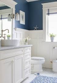 If you like the idea of adding a touch of blue to your bathroom but want to keep it understated and classic try adding a lick of dark navy blue paint to your. Navy Blue And White Bathroom Saw Nail And Paint Coastal Bathroom Design Coastal Inspired Bathrooms Nautical Bathroom Decor