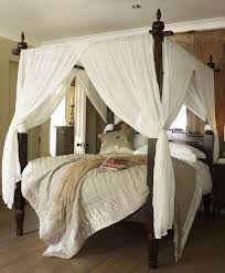 Hang Curtains In A Canopy Bed Canopy Bed Frame Canopy Bedroom Poster Bed Canopy