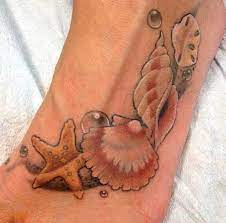 A shell is a hard, protective outer layer of some sea creatures, such as marine mollusks, bivalves, conch, scallop, nautilus, or other sea snails. 40 Shell Tattoos Make You Wonder Sea Life Cuded