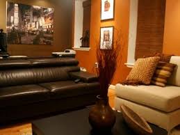 First of all, you can go as rich or as earthy as you like neutral furniture in rich browns and natural wood helps to balance and highlight your stunning wall design. Alex Sanchez S Design Portfolio Living Room Orange Burnt Orange Living Room Living Room Decor Orange