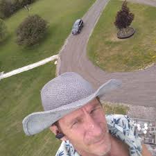 What do Hanover folks think about the new apartment building's rent prices?