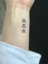 Explore Challenge Transcend Triangle Glyphs Small Wrist Tattoo With Meaning Small Tattoos With Meaning Small Wrist Tattoos Small Side Tattoos