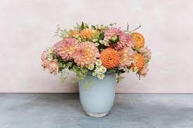 Locally Grown Dahlias In Fiery Shades Of Pink And Orange Floral Design By Winston Flowers Photo Cred Winston Flowers Same Day Flower Delivery Flower Delivery