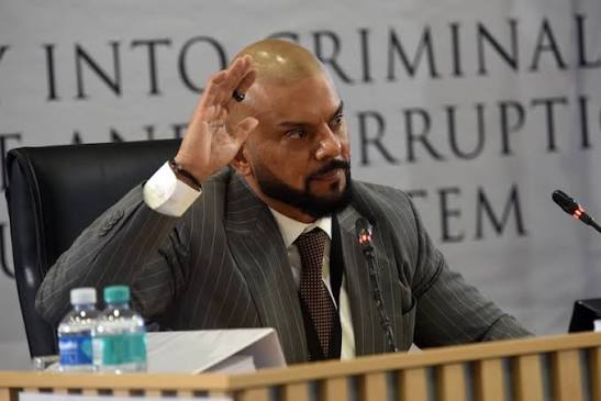 Seen shopping but too ill to testify at Madlanga: Carrim faces charges