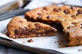 25 Insanely Delicious Cast Iron Desserts Country Cleaver Skillet Chocolate Chip Cookie Cookie Recipes Giant Cookie Recipes
