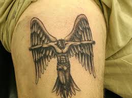 Angel wing with beautiful feathers tattoo design on the back of the girl. Angel Tattoos 45 Unbelievable Collections Design Press