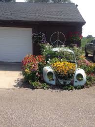 Flower Child Bug Or A Blooming Idiots Memory Of Days Gone By No Matter Which A Perfectly Good Waste Of A Great Li Wolkswagen Canteiro De Flores Volkswagen