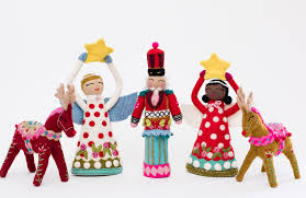 West elm's star burst christmas tree toppers channel a retro spirit, but also bring a bit of romance with that undeniably pretty gold and sparkly silver mix. Nutcracker Tree Topper Christopher