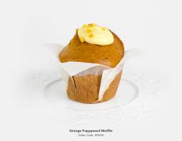 orange poppy seed muffin  spoon