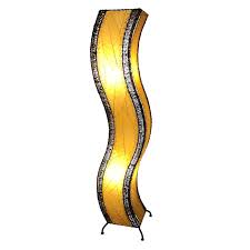 The Large Wave Lamp Puts Design Into Motion With Its Relaxed And Oscillating Design Your Eye Will Natura Large Floor Lamp Floor Lamp Shades