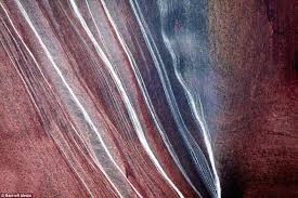 At 1142ft (348m) high, and 5.8mi (9.4km) in circumference, it is undoubtedly one of australia's most. Waterfalls On Uluru A Rare Sight Amusing Planet
