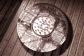 An animated image of cardano altcoin logo which has been illustrated on both sides of a rotating golden token with a mirror surface. Cardano Ada Spicing The Game Up Against Ethereum Eth Ethereum World News
