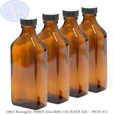 Cylindrical and round plastic bottles made of pet plastic are an excellent option for juice, soda, and tea manufacturing. Aura 200ml Rectangular Amber Glass Bottle With Black Lid Pack Of 4 Buy Online In Andorra At Andorra Desertcart Com Productid 139878890