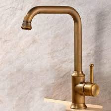 Finished in antique brass, this kitchen faucet creates a smooth transition between the past and contemporary. Brass Taps Kitchen Brass Kitchen Faucet Brass Kitchen Tap Antique Kitchen