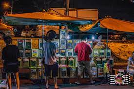 Apart from its array of street snacks, check out the accessories and clothes they have to offer from beaded bracelets to cartoon hair clips. Paya Terubong Night Market On Every Sunday Penang Crisp Of Life