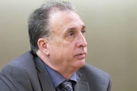 Pierce County sheriff's trial delayed, lawyers say he has flu