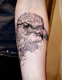65 Small Eagle Tattoo Designs And Ideas For Men Falcon Tattoo Small Eagle Tattoo Eagle Tattoo