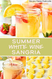 This Summer White Wine Sangria Is Full Of Strawberries And Oranges Sweetened With Pineapple Ju Summer Sangria Recipes White Wine Sangria Summer Drinks Alcohol