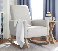 We love this glider because it's beautiful, easy to clean and practical. Phoenix Rocking Chair Ottoman Pottery Barn Kids