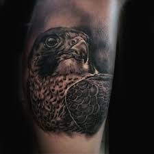 Bird Of Prey Tattoo Designs 90 Falcon Tattoo Designs For Men Winged Ink Ideas Tattoos For Guys Falcon Tattoo Tattoo Designs Men