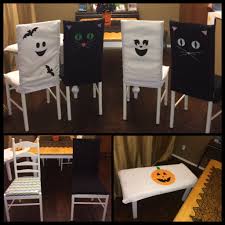 Black And White Dining Chair Covers Halloween Chair Covers I Made For Our Dining Room Chairs Using Old Black Curtains And Old White Diy Chair Covers Chair Covers Party Scandinavian Dining Chairs