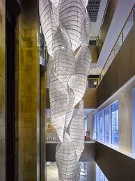 The Biggest Lighting Installation We Delivered Can Be Found Suspended In The Hotel Atrium Made Of More T Hotel Lobby Design Hotel Chandelier Luxury Chandelier