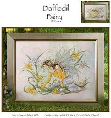 I have free cross stitch patterns of hummingbirds and other birds, as well as a bluebird alphabet, ladybug alphabet, butterfly patterns, and southwest from 123 stitch, these patterns are yours to download and use at no charge. Joan Elliott Daffodil Fairy Cross Stitch Pattern 123stitch Com Cross Stitch Cross Stitch Fairy Cross Stitch Numbers