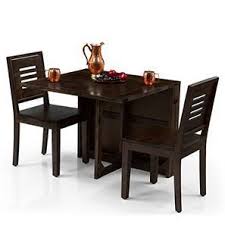From the latest styles of dining room tables to bar stools, ashley homestore combines the latest trends with technology to give you the very best for your home. Folding Dining Table Sets Buy Folding Table Sets Online Urban Ladder