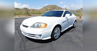 Image result for Triton Green 2004 Tiburon