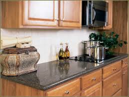 Uba tuba granite with light hioney oak cabinets / i'm having a bit of concern over the uba tuba granite we chose for our new construction. Home Desain Kitchen Backsplash Ideas With Oak Cabinets