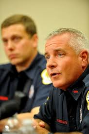 Firefighters discuss hostage situation