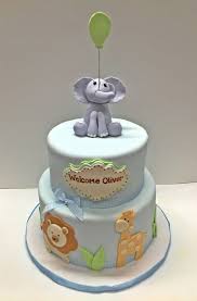 Jungle baby shower such a cute invitation , that has the theme for the nursery also, was used for inspiration for this cake. Safari Animal Baby Shower Cake Animal Baby Shower Cake Baby Shower Cakes Safari Cakes