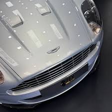 Image result for Lightning Silver 2010 Aston Martin