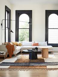 Vintage rugs look great in both modern and more traditional living rooms. 10 Living Room Rug Ideas That Tie A Space Together In A Snap Modern Rugs Living Room Rugs In Living Room Living Room Tiles